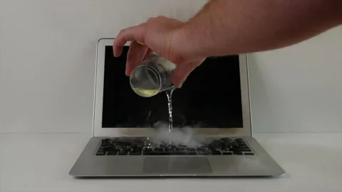 Laptop Overheating - Sizzling Keyboard and Smoke Stock Footage 130463571