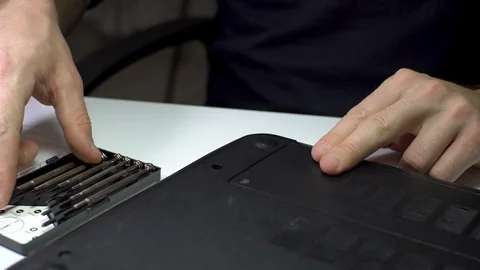 Laptop PC Computer Repairment with Micro Screwdriver Stock Footage 129824557