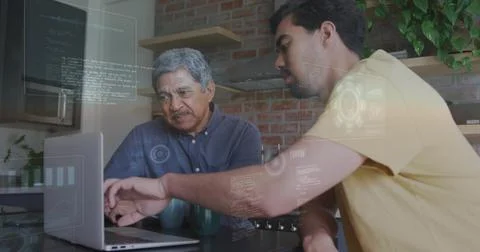 Laptop pinging pair leaning in, right man pointing, senior studying HUD overlays Stock Photos