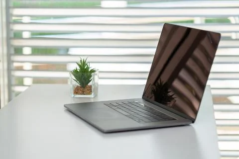 The laptop is placed on the work desk. Working in the office. Business concep Stock Photos