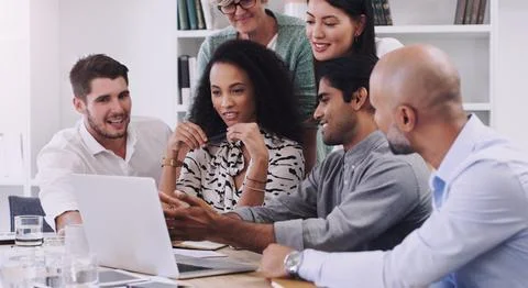 Laptop, problem solving and business people in a meeting in office for planning Foto stock