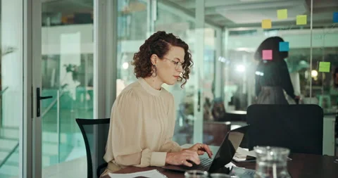 Laptop, problem solving and solution with designer woman in office for Stock Footage 294909155