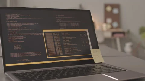 Laptop with Program Codes and Sticker Note on Screen Stock Footage 195977417