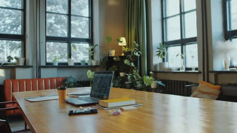 Laptop with Programming Code on Display at Table in Library or Office Stock Footage 274654122