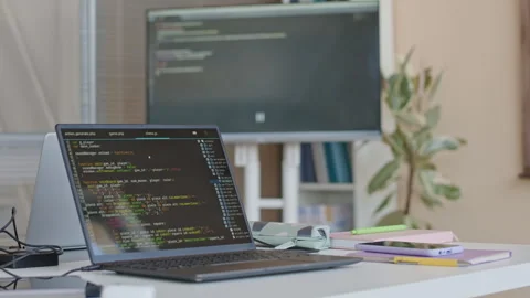 Laptop with Programming Code on Screen in Classroom Stock Footage 257059403