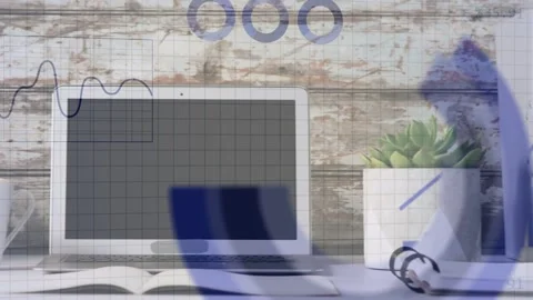 Laptop receiving data feed, displaying growing line and bar graphs, showing Stock Footage 334744270
