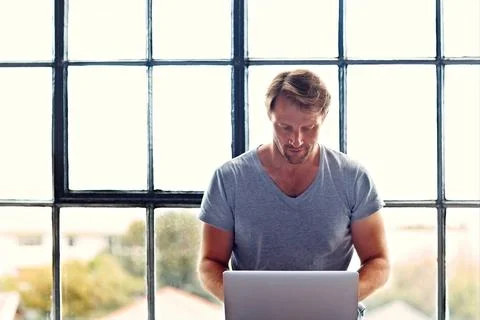 Laptop, remote work and window with man in home for planning, research assi.. Stock Photos