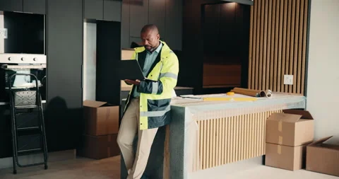 Laptop, renovation and thinking with black man in kitchen for home improvement Stock Footage 337764855