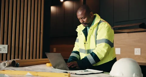 Laptop, renovation and thinking with black man in kitchen for home improvement Stock Footage 337765525