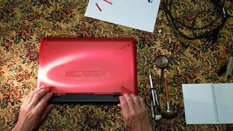 Laptop repair. The wizard repairs the computer. Stock Footage 115089532