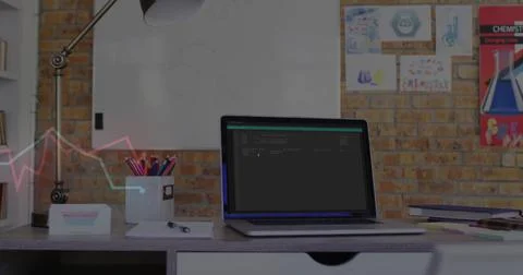 Laptop running code at home office, with lamp, notebook, whiteboard and Stock Photos