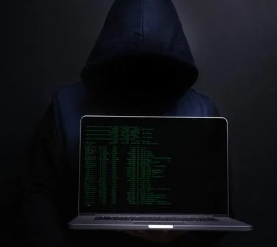 Laptop, screen and hacker with coding in studio for cyber attack, ransomware or Stock Photos