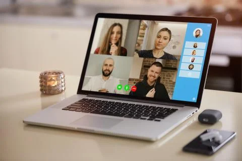 A laptop screen view of the telecommunications application during online meet Stock Photos