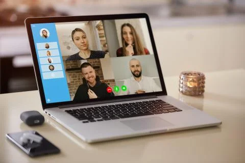 A laptop screen view of the telecommunications application during online meet Stock Photos