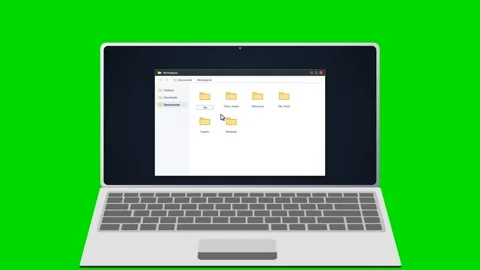 Laptop showing file explorer with folder being renamed on green screen. 4K Stock Footage 341693907