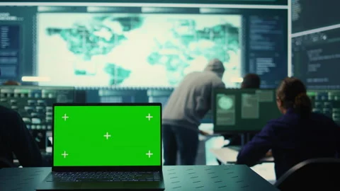 Laptop showing green screen in a governmental high tech office Stock Footage 277672811