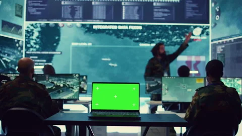 Laptop showing isolated mockup screen in army base of operations Stock Footage 277001940