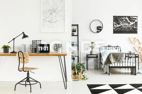 Laptop in simple boy's bedroom Stock Photos