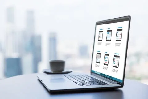 Laptop with smartphone interface design on screen Stock Photos