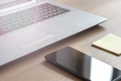 Laptop,  smartphone, notes. Stock Photos