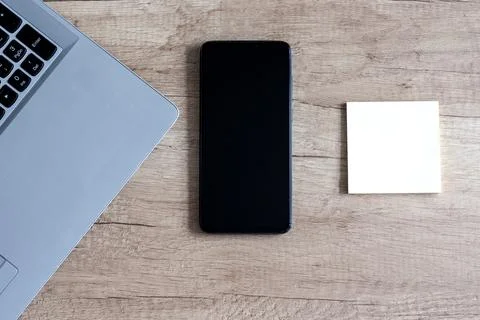 Laptop,  smartphone, notes. Stock Photos