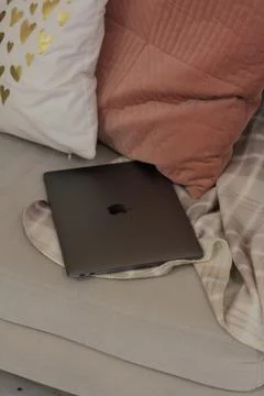 The laptop on sofa Stock Photos