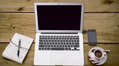 Laptop start work. phone with Stock Footage 62344635