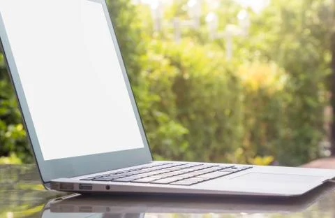 Laptop on stone table Stock Photos