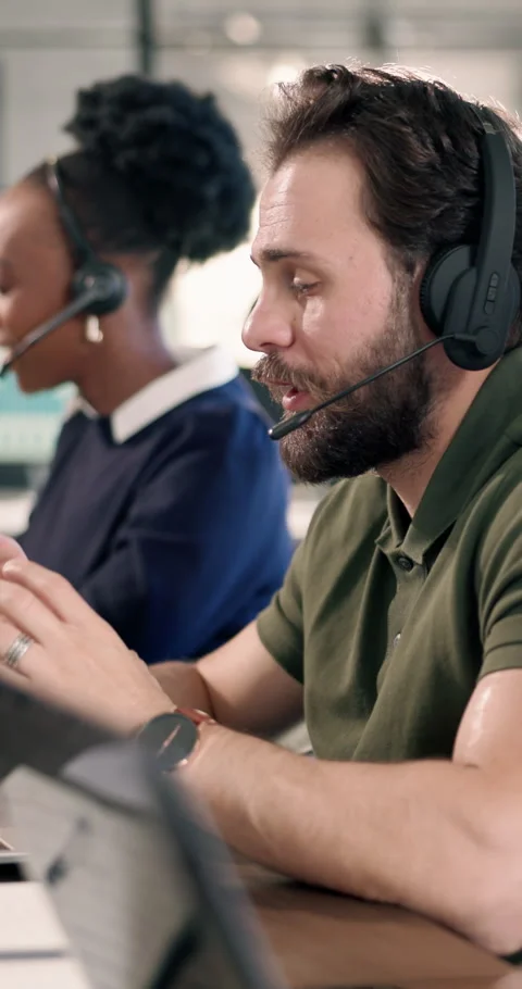 Laptop, support and man with headset in agency for customer service or online Stock Footage 340773109