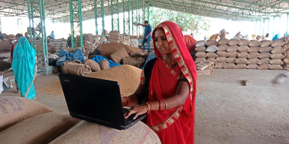 Laptop technology using by indian poor people. Stock Photos