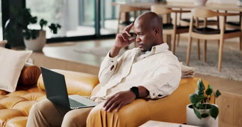 Laptop, thinking and black man with stress in home, remote work challenge and Stock Footage 336848221