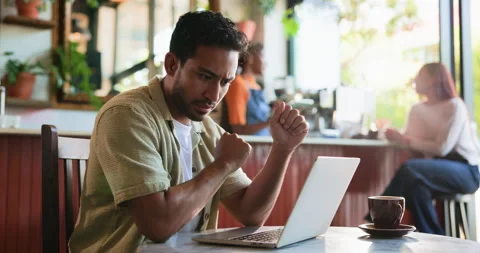 Laptop, thinking and man in cafe for remote work, news idea or inspiration for Stock Footage 330995763