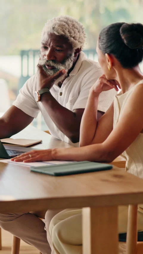 Laptop, thinking or interracial couple in home for finance, investment or budget 動画素材 346280644