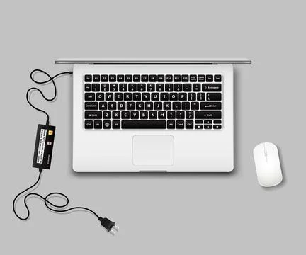 Laptop top view with computer mouse and charger unplugged Illustrazione stock
