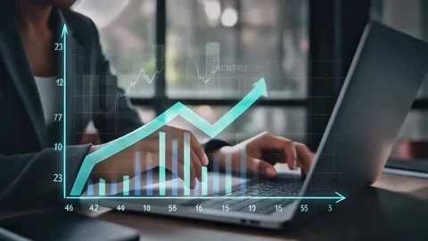Laptop Typing With Financial Growth Graph Overlay 库存影片 338066714