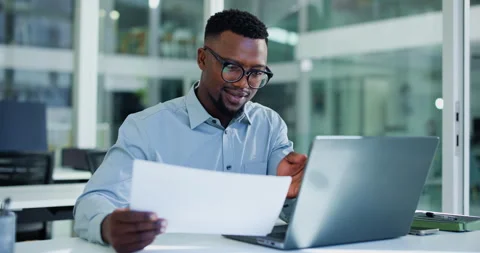 Laptop, typing or black man with paper in office, income statement audit or Stock Footage 326450211