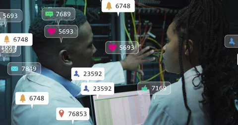 Laptop updating, two IT techs checking cables and patch panel while icons Stock Footage 331833009