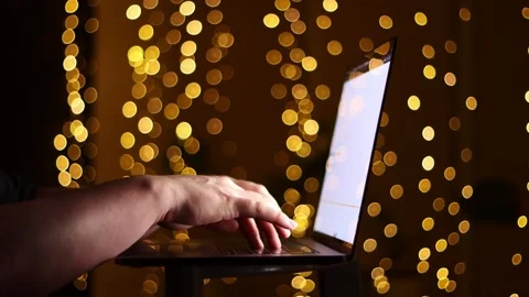 Laptop Use with Bokeh Light Background Stock Footage 339056692