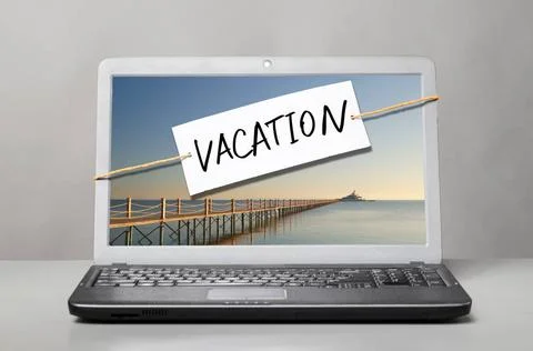 Laptop with vacation note laptop with note about vacation Copyright: xZoon... Stock Photos