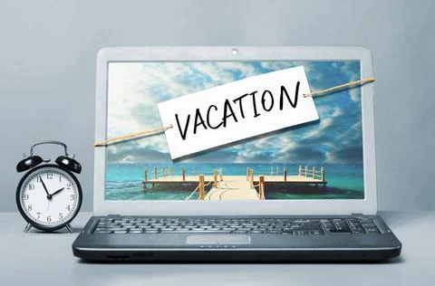 Laptop with vacation note laptop with note about vacation Copyright: xZoon... Stock Photos