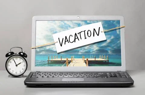Laptop with vacation note laptop with note about vacation Copyright: xZoon... Stock Photos