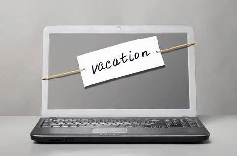 Laptop with vacation note laptop with note about vacation Copyright: xZoon... Stock Photos