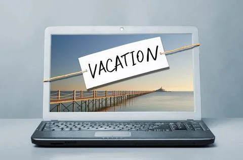 Laptop with vacation note laptop with note about vacation Copyright: xZoon... Stock Photos