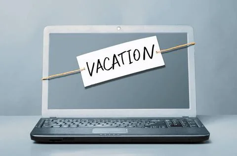 Laptop with vacation note laptop with note about vacation Copyright: xZoon... Stock Photos