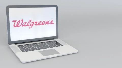 Laptop with Walgreens logo. Computer technology conceptual editorial 3D 스톡 일러스트