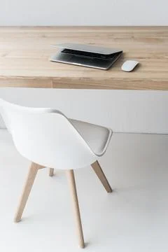 Laptop with wireless mouse Stock Photos