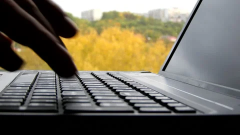 Laptop, women's hands, window. Work on a laptop  Stock Footage 152758968