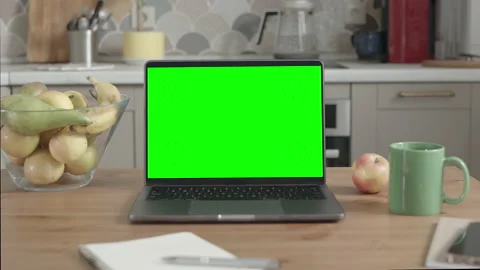 Laptop on Wooden Table in Kitchen Interior Stock Footage 170510143