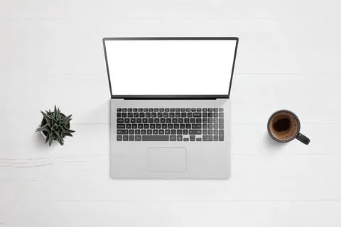Laptop on work desk with isolated screen for app or web page design showcase. Stock Photos