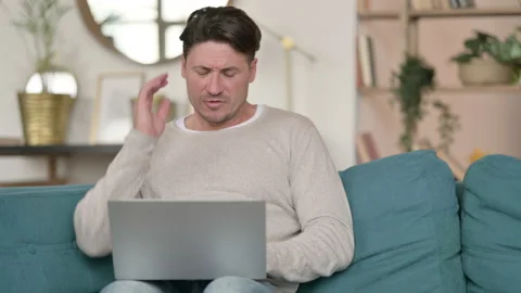 Laptop Work by Middle Aged Man with Neck Pain at Home Video stock 142375842